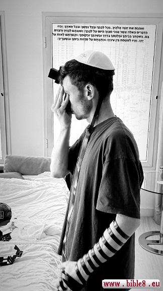 Prayer with Tefillin. 
Interpretation of Deut 6. Comments on Deuteronomy 6